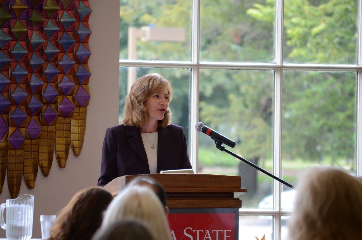 Cathann Kress, VP of Iowa State University Extension and Outreach, speaks to participants at the National Educator's Conference at Iowa State University.