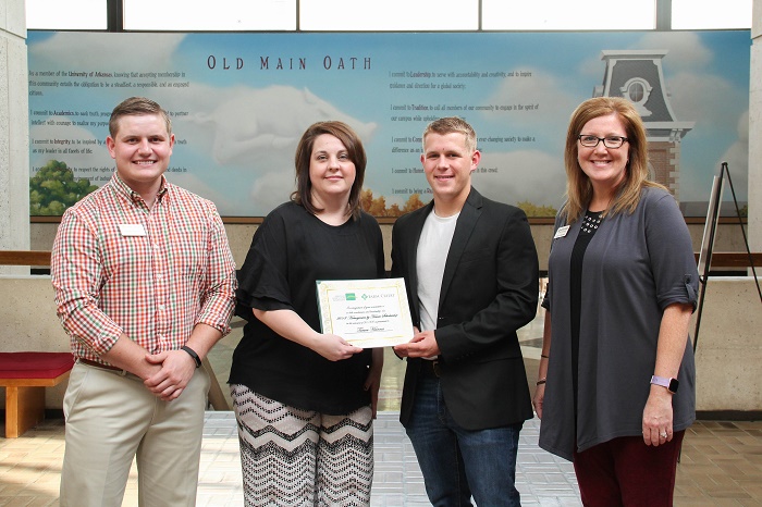 Hunter Daniel (Farm Credit of Western Arkansas), Melissa Coles (Farm Credit Midsouth) and Leslie Brown (AgHeritage Farm Credit Services) present the Homegrown by Heroes Scholarship certificate to Trever Hanna. Trever is a member of the Army National Guard and attends the University of Arkansas.